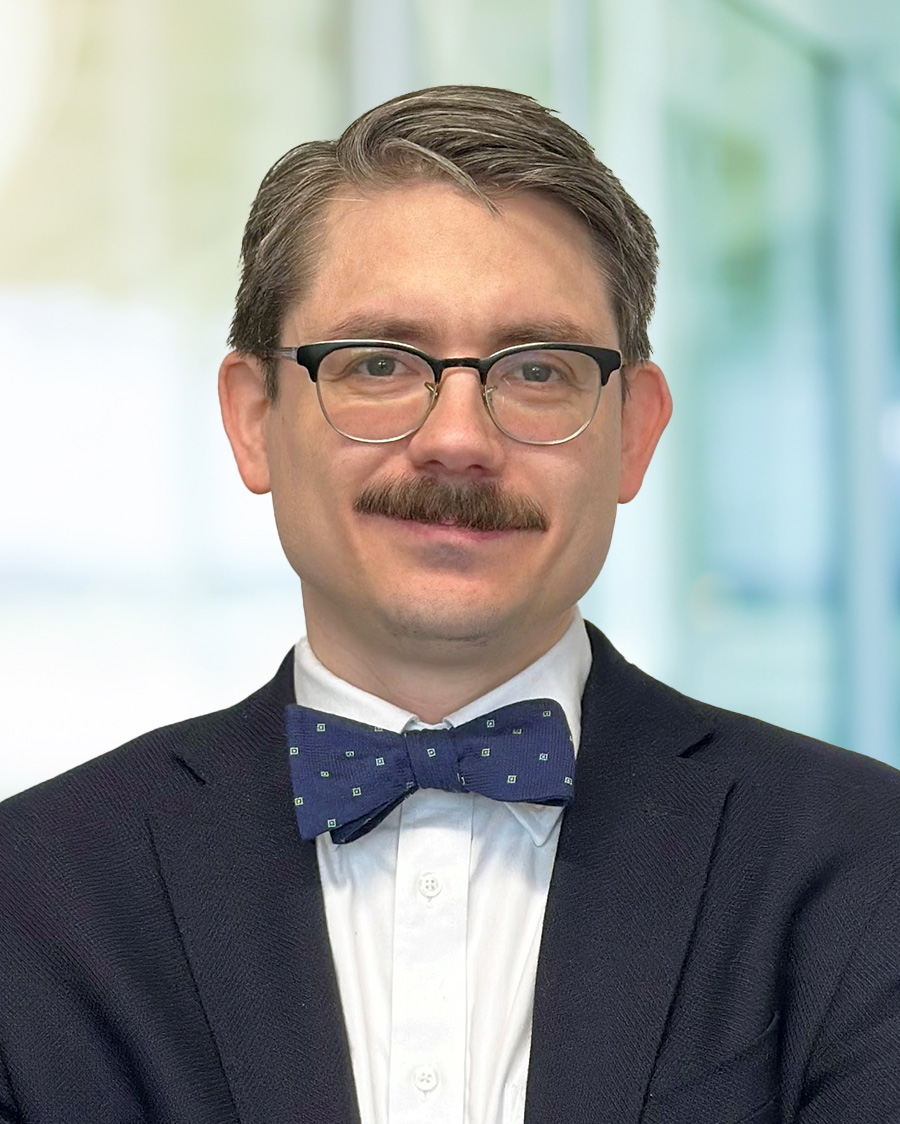 man in black suit and bow tie