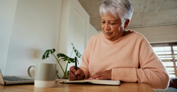 elderly lady writing