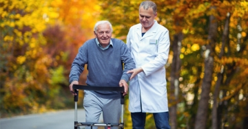 elderly walk with doctor