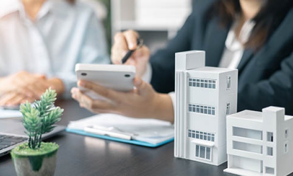 sitting at a desk having a meeting