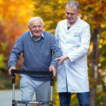 elderly walk with doctor